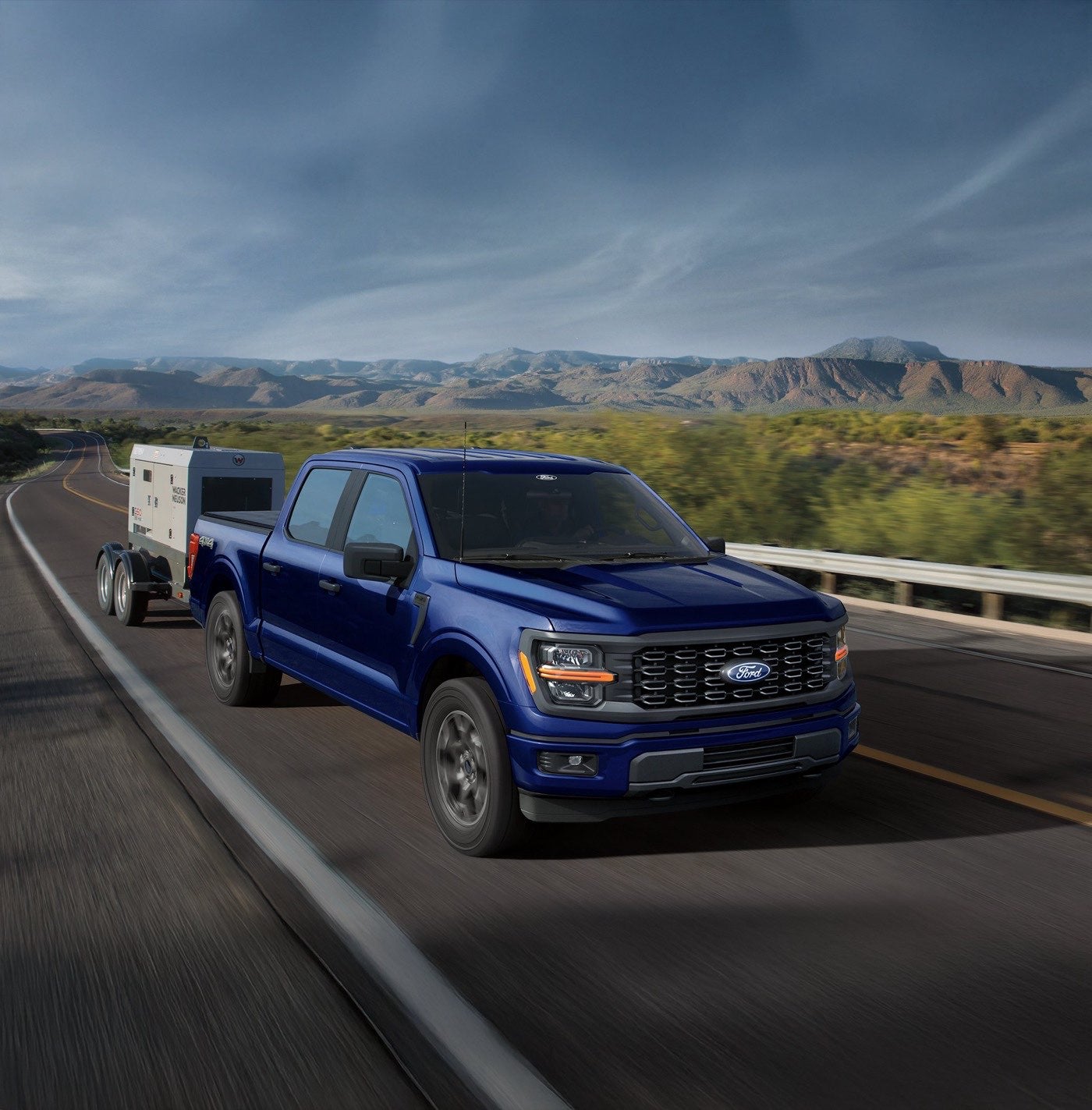 Ford F-150 XL pulling a small trailer
